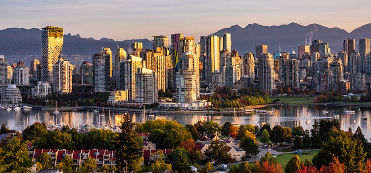 Landscape view of Vancouver with sun shining on high rise buildings