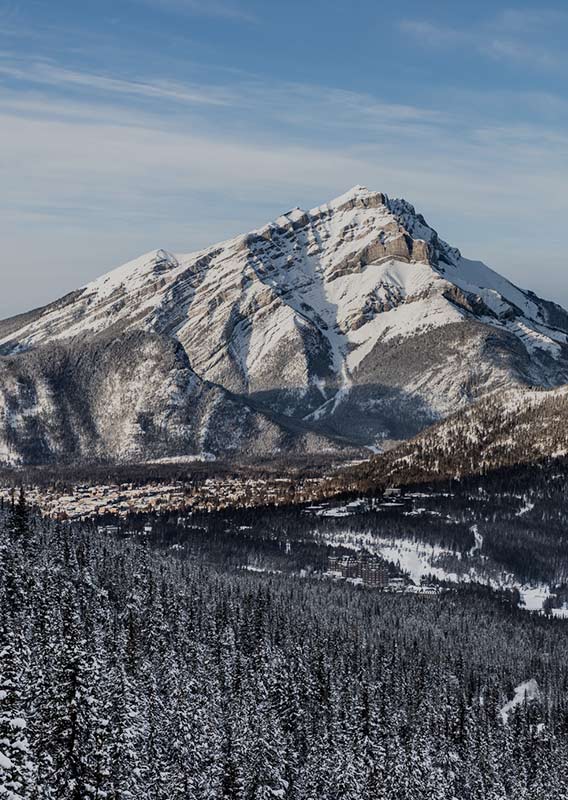 A winter view of the Town of Banff from above at the Banff Gondola