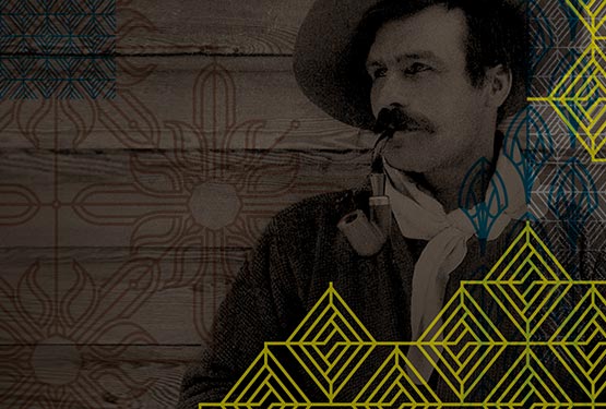 A man in a cowboy hat looks to the side with geometric graphics overlaid