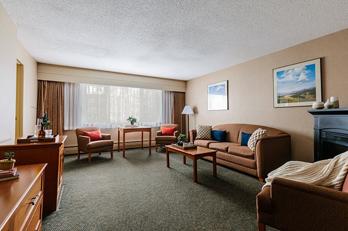 A kitchenette in a hotel room.