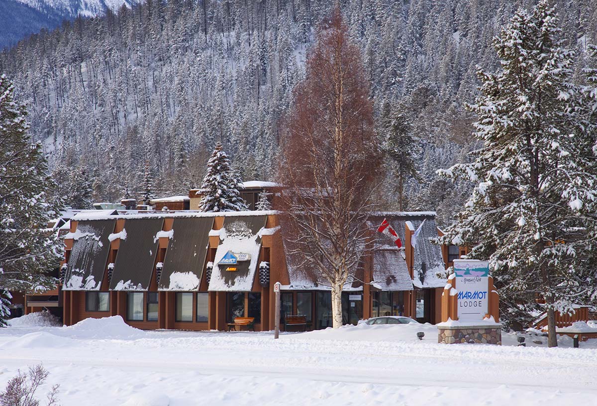 Marmot Lodge Official Page Jasper hotel, pool, hot tubs, kitchen