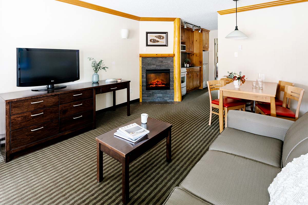 Marmot Lodge Official Page Jasper hotel, pool, hot tubs, kitchen