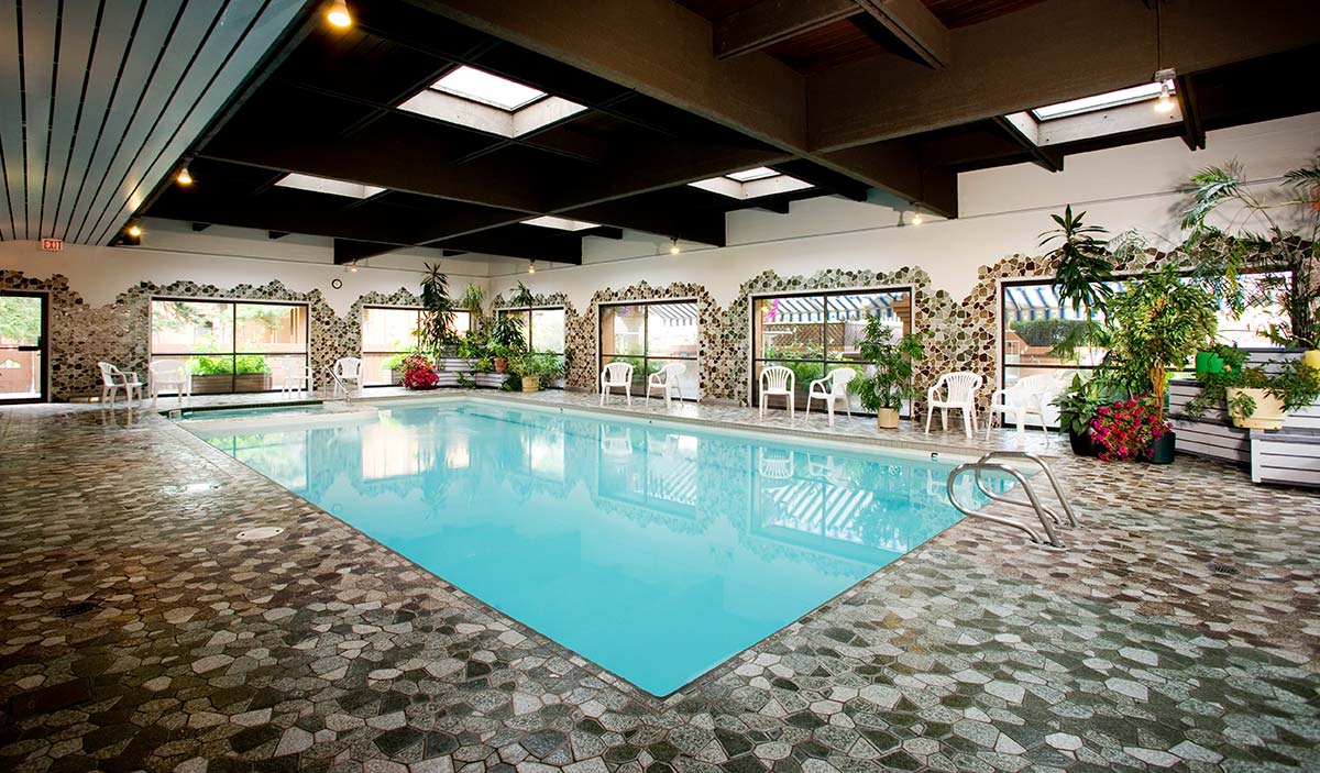 Marmot Lodge Official Page Jasper hotel, pool, hot tubs, kitchen