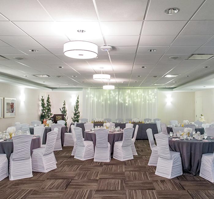 Wedding seating prepared in a venue inside The Crimson hotel