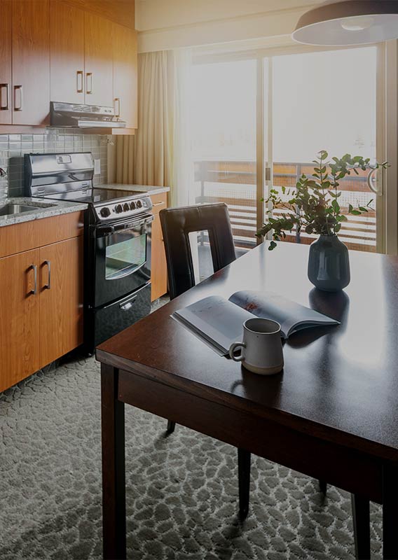 Mug and magazine on a table in a hotel suite