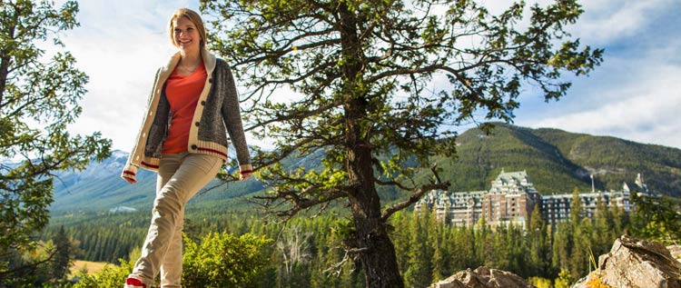 Girl at Surprise Corner overlooking the Banff Springs