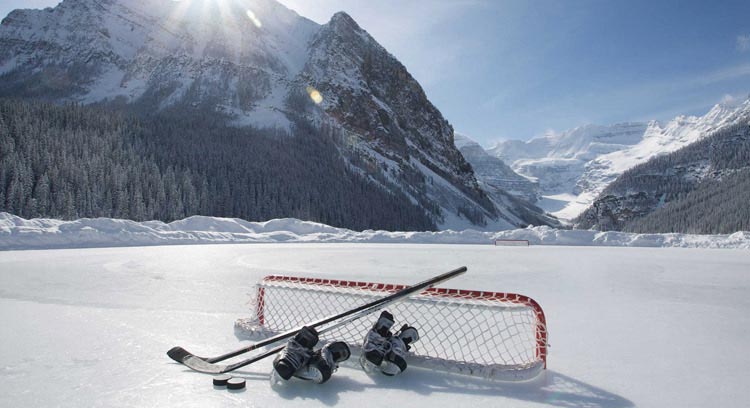 Hockey net and skates on the ice skating rink at Fairmont Chateau Lake Louise