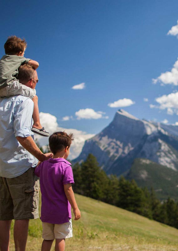 Family Looking out over Banff from a viewpoint