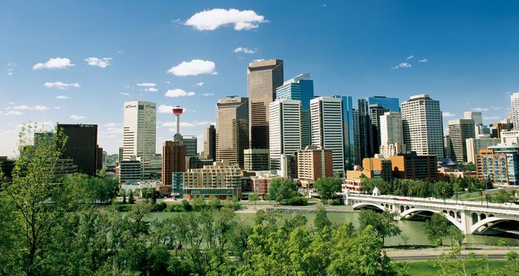 Downtown Calgary's skyscrapers under a blue sky