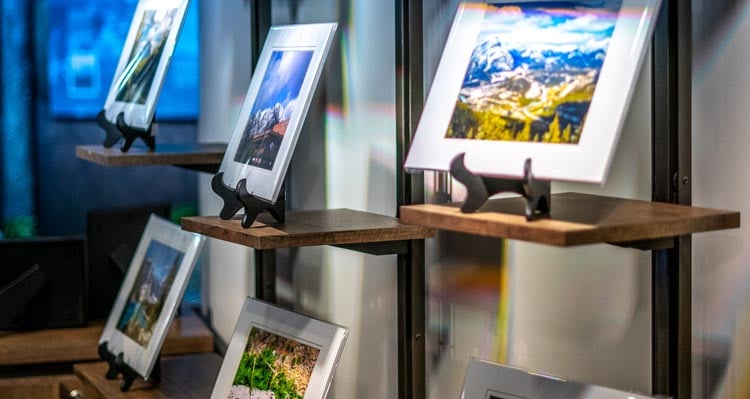 A set-up of outdoor photography on shelves