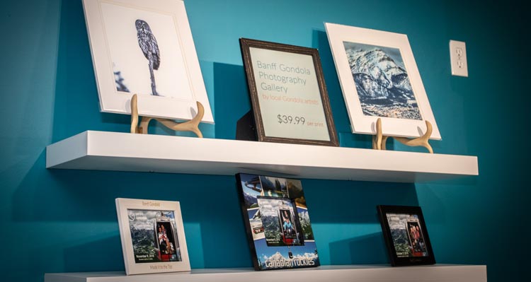 A series of photos on display for sale.