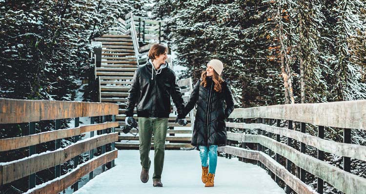 Visitors walking along the boardwalk at Sulphur Mountain