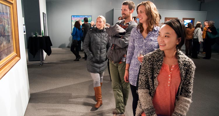 A group of people at an art gallery