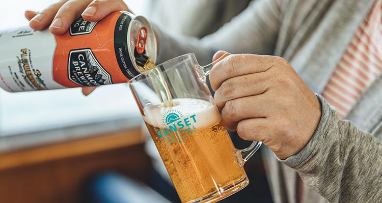 A beer pouring into a glass.