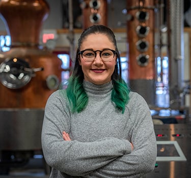 Eau Claire Distillery Caitlin Quinn smiling