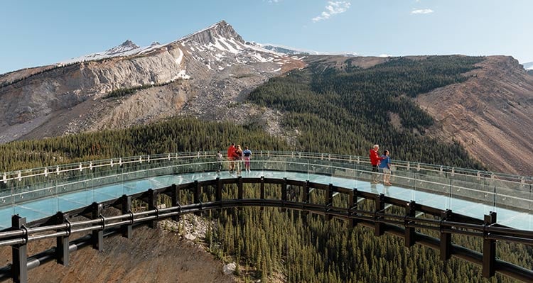 A view of a glass platform out above a deep valley.