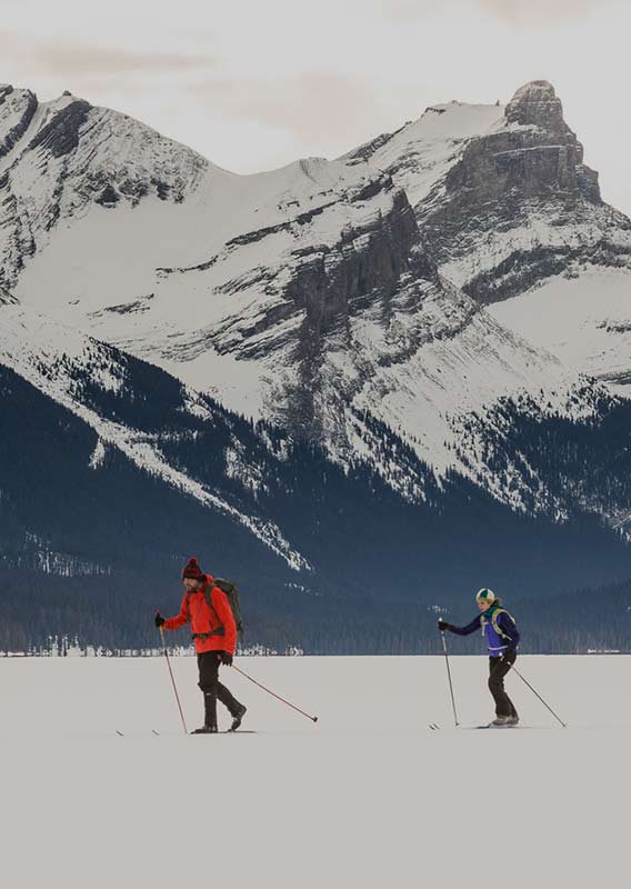 Cross country skiers on a frozen lake