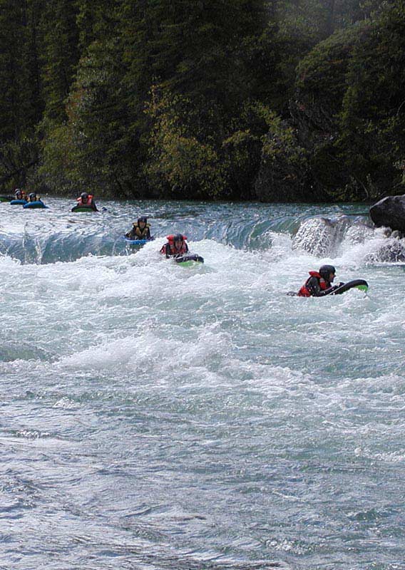 Group of riverboarders on Kananaskis River