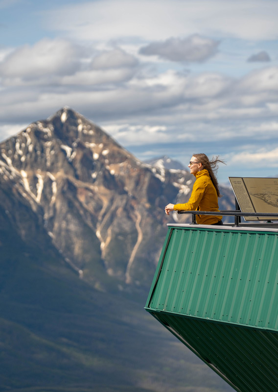 A person taking in the view of Whistlers Mountain at Jasper SkyTram