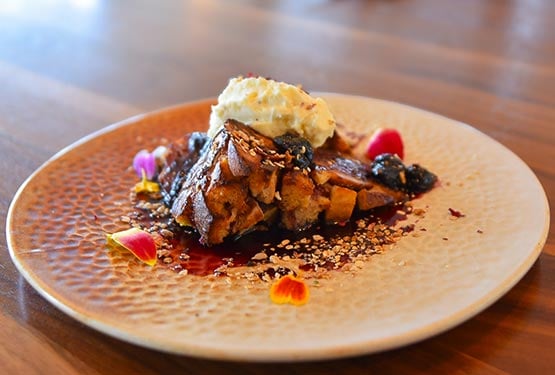 A brunch plate at a restaurant table.