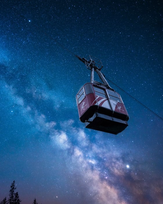 The Jasper SkyTram ascending the tramway under a starry sky