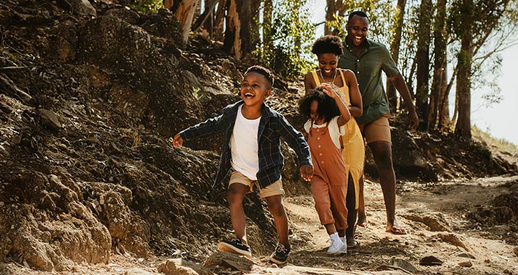 A family of four taking a family-friendly hike