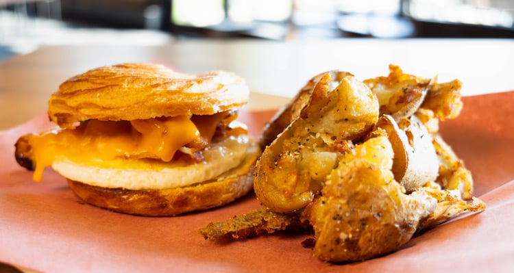 A breakfast sandwich and roasted potatoes from Silverwater Grill
