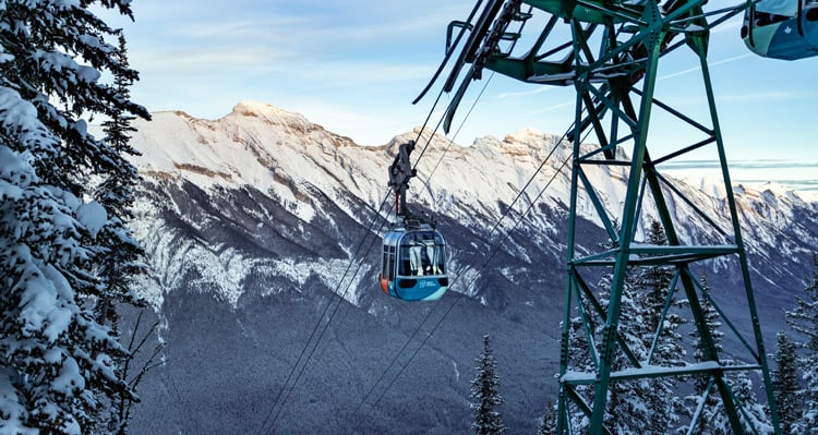 The Banff Gondola ascending the lift in the winter