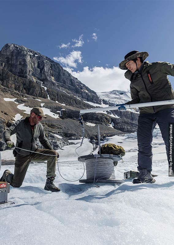 Two researchers on Columbia Icefield.