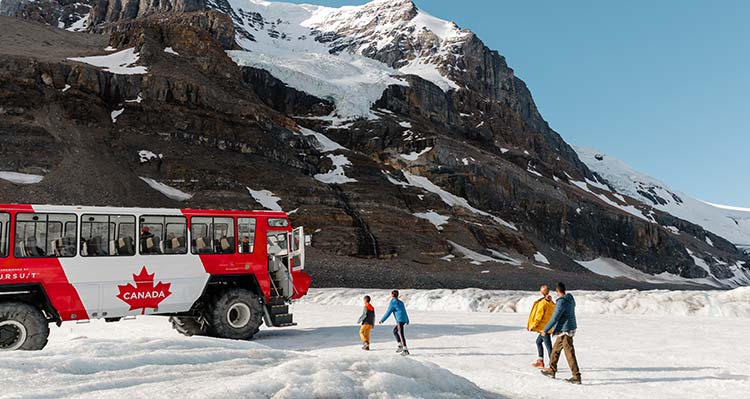 A family getting on the bus at Columbia Icefields