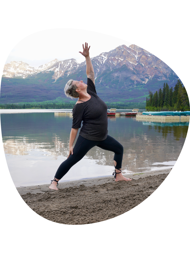 A yoga instructor on the beach.