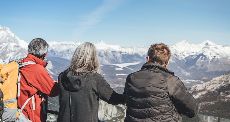 People taking in the view from a Banff Gondola viewpoint