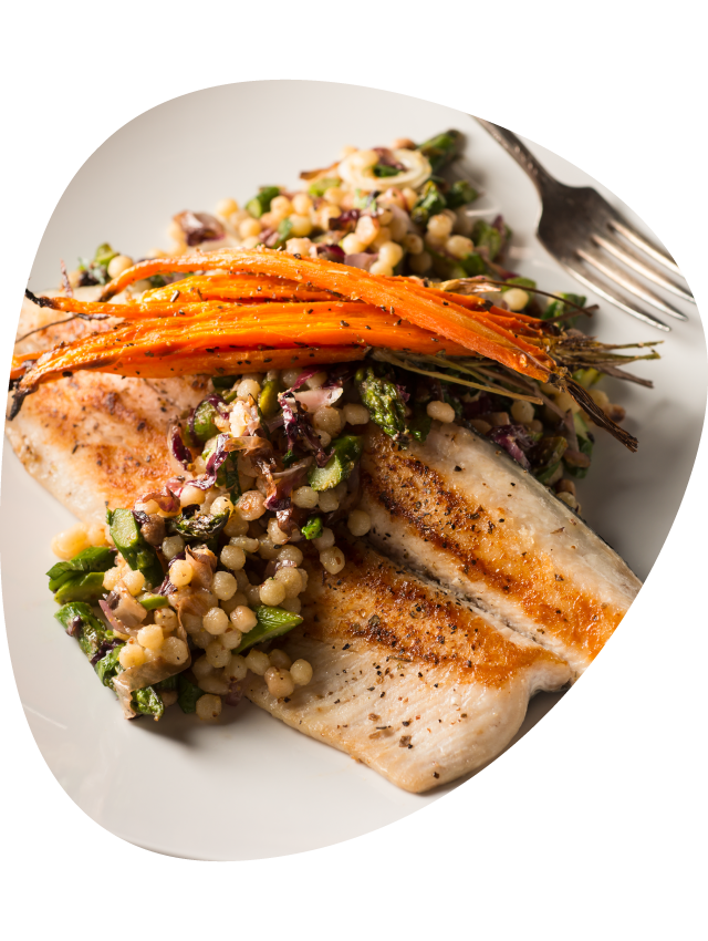 A plate of fish on a dinner plate.