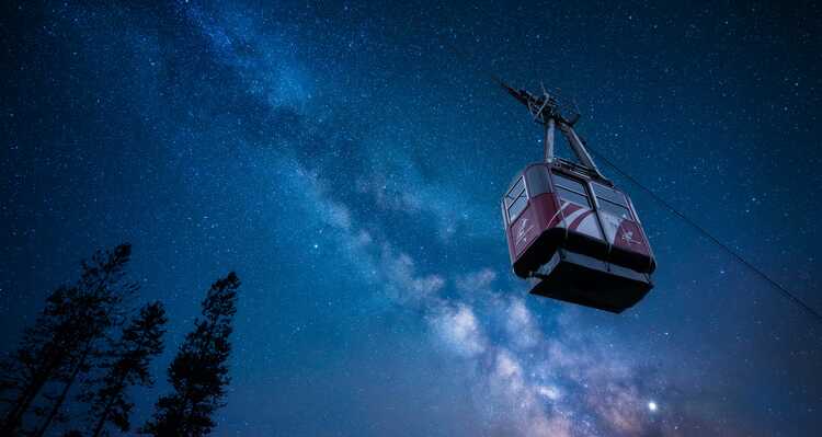 Jasper SkyTram ascending the tramway under a starry sky