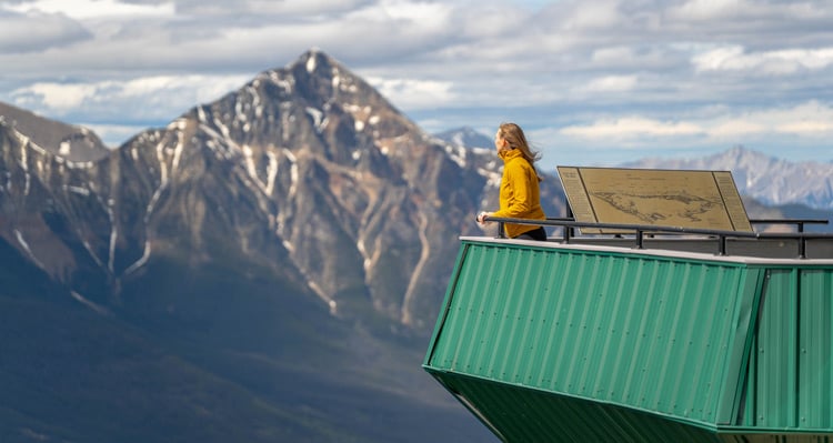 A person taking in the view at the Jasper SkyTram